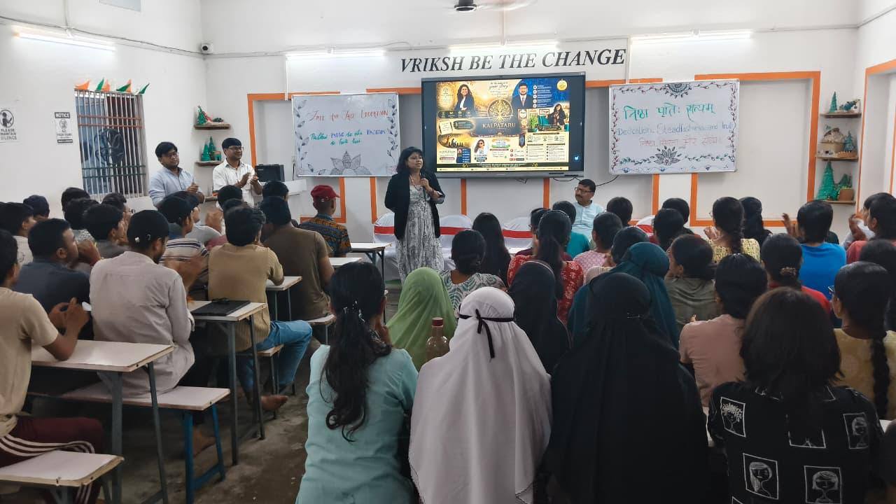 Sunita speaking with students preparing for competitive exams